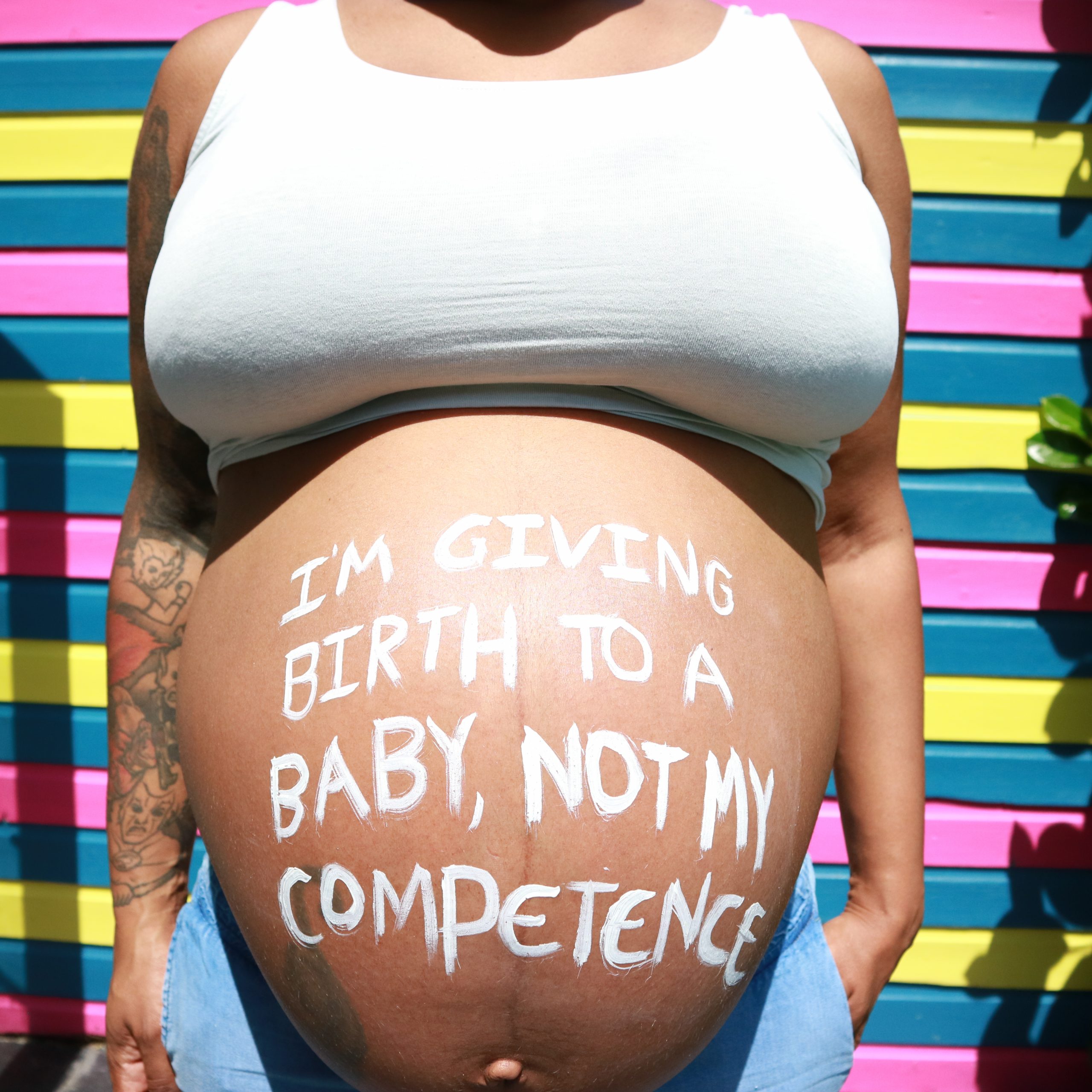 Alt text: photo of pregnant woman with the words 